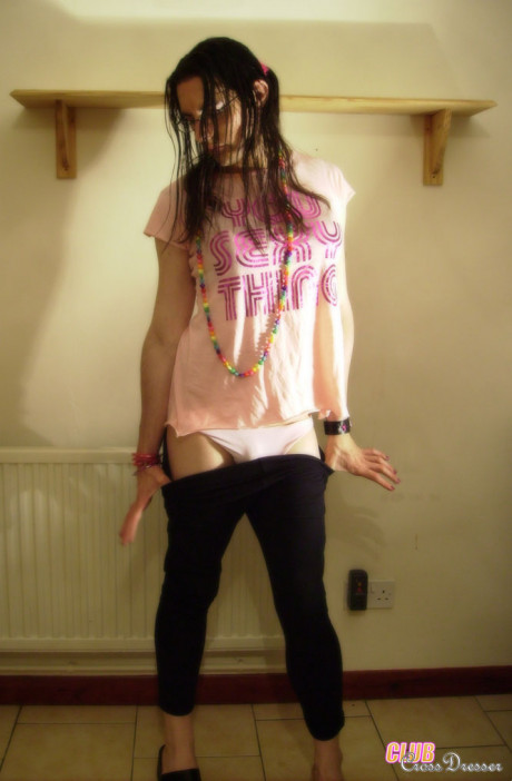 This crossdresser enjoys to put on her sweet pink outfits for the camera
