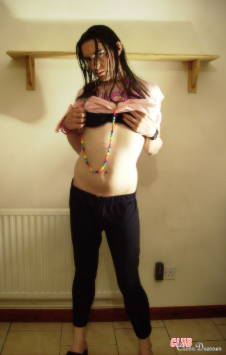 This crossdresser enjoys to put on her sweet pink outfits for the camera - #692285
