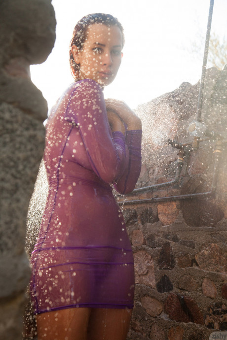 Busty babe Orli Krowan loses her sheer purple dress outdoors & takes a shower - #399221