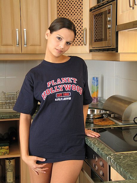 Hot young Eva strips to show her sexy breasts & toy her bald vagina in the galley - Image 1 of 21  in Pussy category   featuring Eve Angel