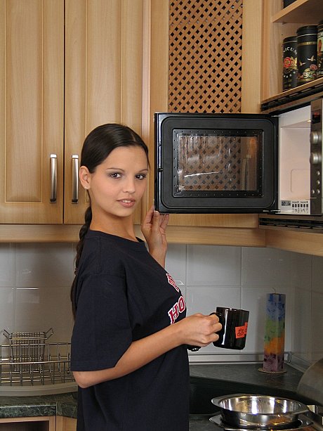 Hot young Eva strips to show her sexy breasts & toy her bald vagina in the galley - Image 3 of 21  in Pussy category   featuring Eve Angel