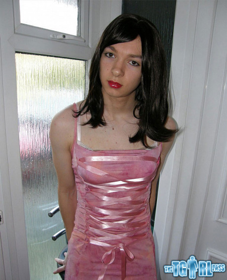 Skinny shemale showing off that slender body of hers in a pink dress - #1051062