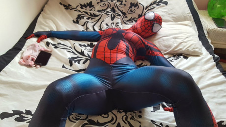 Cosplayer shows off her tight ass in a Spiderman costume on her bed - #173769