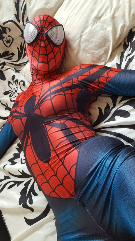 Cosplayer shows off her tight ass in a Spiderman costume on her bed - #173772