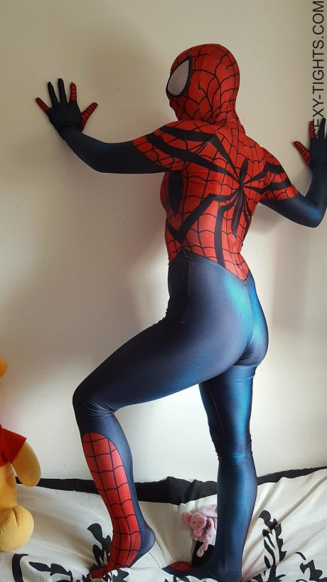Cosplayer shows off her tight ass in a Spiderman costume on her bed - #173773