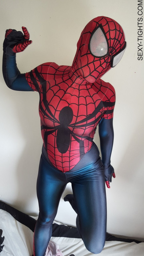 Cosplayer shows off her tight ass in a Spiderman costume on her bed - #173778