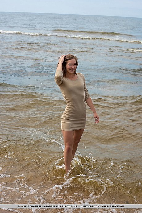 Tall teenie Mina hangs wet clothes to dry while posing undressed on a beach - Image 2 of 18  in Model category   featuring Mina 