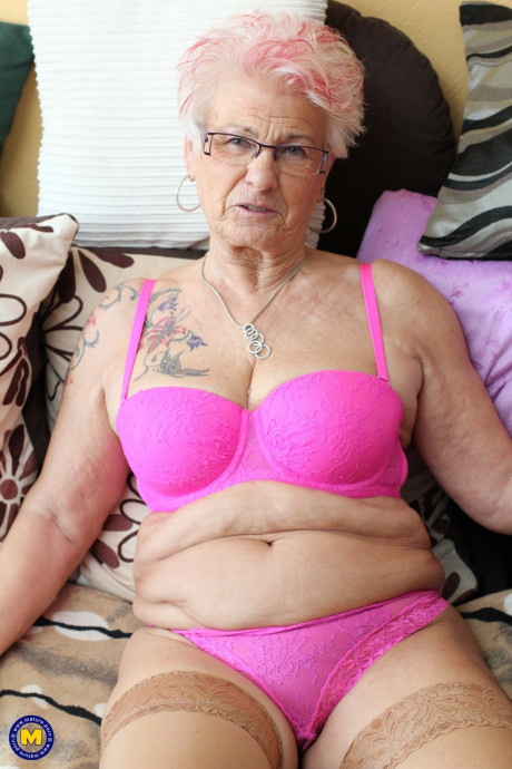 German grandma Gerdi strips & spreads her pretty shaved mature snatch on a bed - #331127