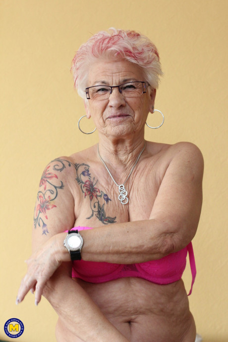 German grandma Gerdi strips & spreads her pretty shaved mature snatch on a bed - #331128