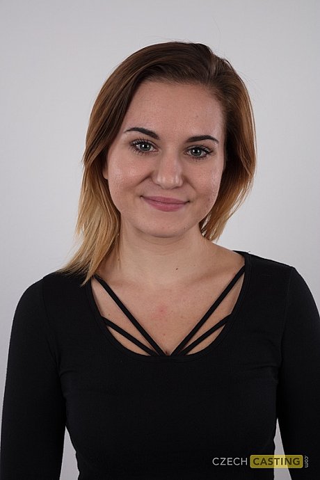 First timer Lucie contains a smile while getting completely nude - Image 1 of 20  in Close Up category   featuring Lucie 