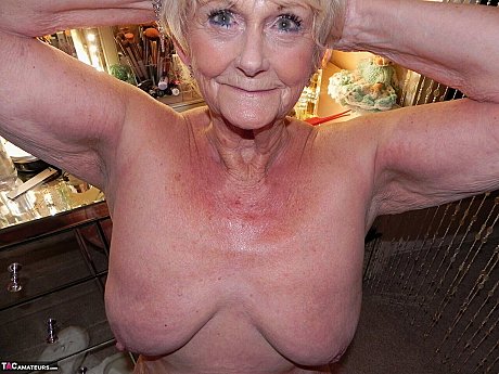Blondy grandma Sparkle shows her enormous saggy titties and raw feet in the naked - Image 8 of 16  in Close Up category   featuring Sparkle 