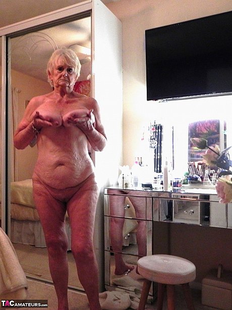 Blondy grandma Sparkle shows her enormous saggy titties and raw feet in the naked - Image 14 of 16  in Close Up category   featuring Sparkle 