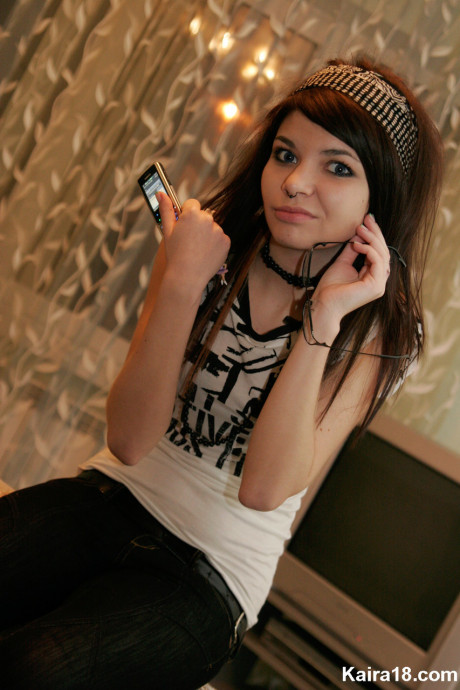 Barely legal teenie Kaira 18 takes her glasses off while modeling non undressed #69729