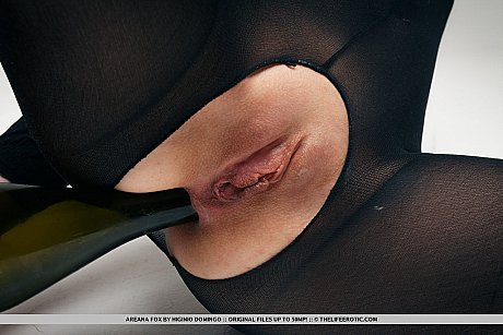 Fetish chick girl broad Areana Fox in crotchless catsuit stuffs a wine bottle in her vagina - Image 13 of 16  in Model category   featuring Areana Fox 