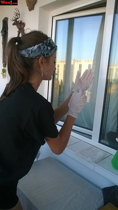 Cute housewife WouJ flaunts her large ass while cleaning the windows outdoors - Image 1 of 15  in Teen category   featuring WouJ 