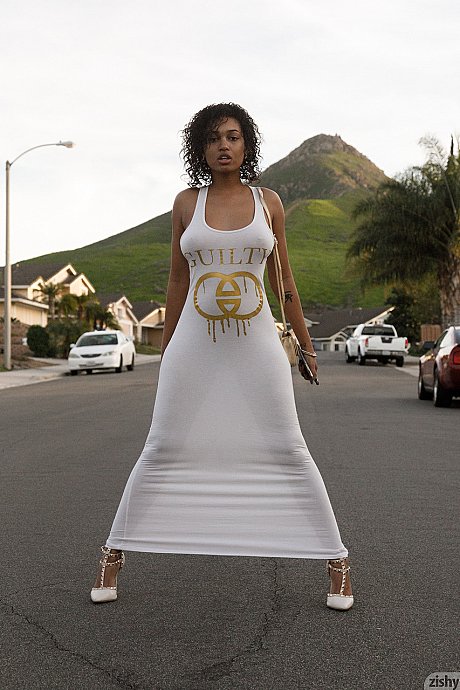 Black Noelle Monique hikes up her white dress & flashes her vagina & enormous boobs - Image 2 of 12  in Outdoor category   featuring Noelle Monique 