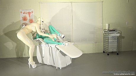 Slutty Latex Lara in full body latex gets toyed by a busty latex-clad doctor - Image 9 of 16  in Dildo category   featuring Latex Lara 