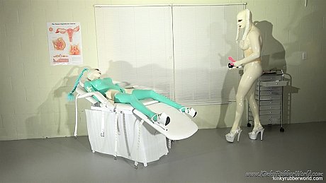 Slutty Latex Lara in full body latex gets toyed by a busty latex-clad doctor - Image 16 of 16  in Dildo category   featuring Latex Lara 