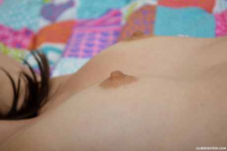 Skinny brunette teenie Emily G unveils her hard nips and plays with a vibrator - #1219428