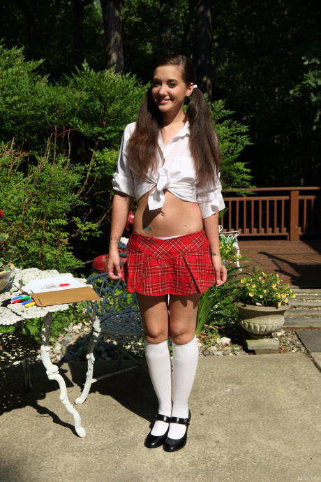 Fantastic young schoolgirl Gia Paige shows her body and toys herself outdoors - #334840