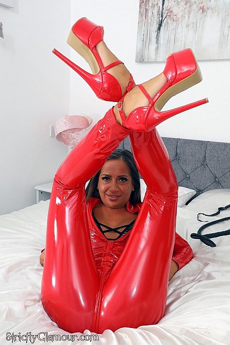 British MILF Lara Lee unzips from a red latex catsuit in matching heels - Image 5 of 12  in Model category   featuring Lara Lee 