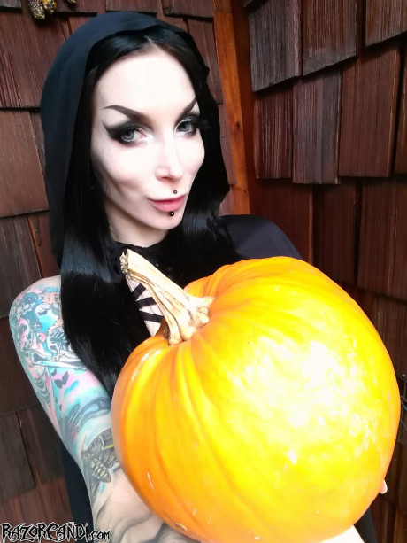 Goth whore GF chick Razor Candi flaunts her enormous ass over a pumpkin in Halloween attire - #1227351