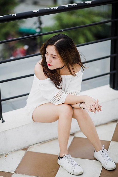 Adorable oriental sluts posing in their hot white outfits in public