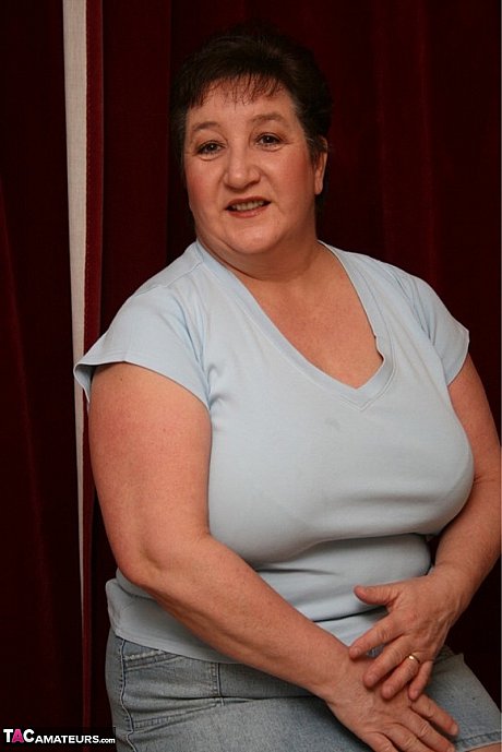 Cougar fatty slutty Carol hikes up a denim miniskirt to show her huge ass - Image 1 of 16  in Amateur category   featuring Kinky Carol 