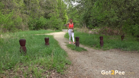 Red Hair Dafne squats to piss on woodland path - #48760
