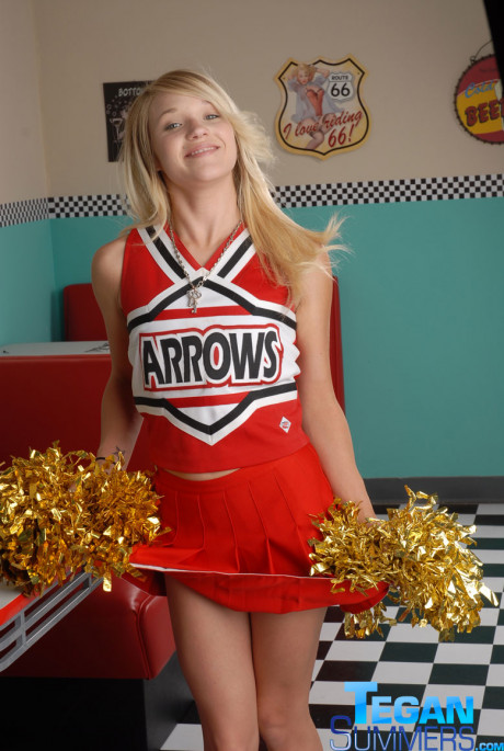 Sweet college yellow-haired Tegan Summers poses in a cheerleader outfit at a diner - #108071