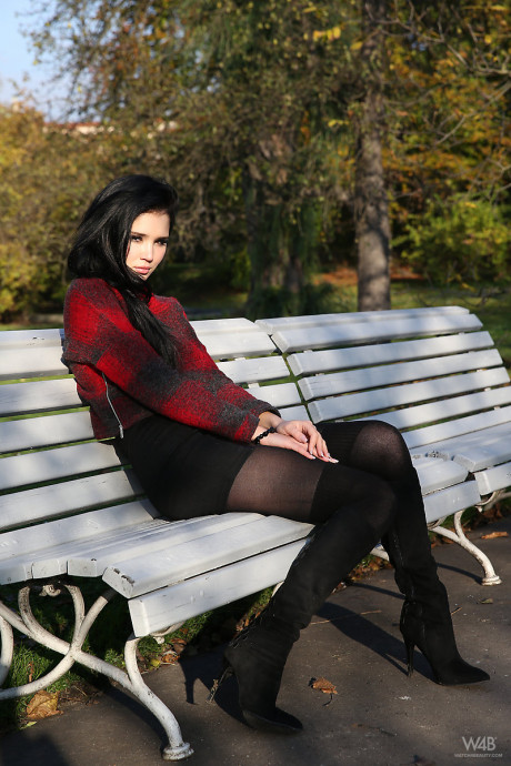 Brunette glamour model Malena in boots posing non nude outdoors