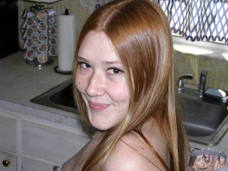 Fresh young redhead Harper grabs her behind while showing her trimmed muff on a bed - #530750