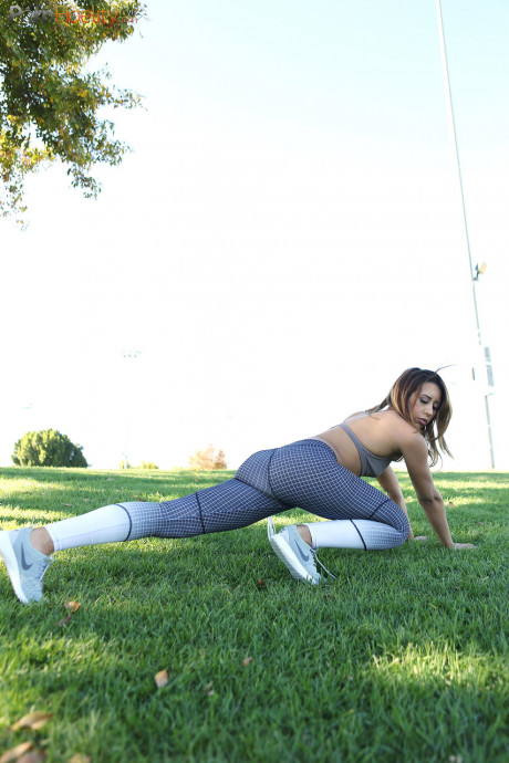 Exercising brunette Demi Lopez pause to masturbate clothed cunt on the lawn - #152590
