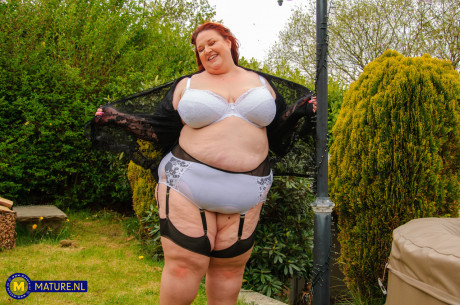 Morbidly obese cougar ginger dildos her pussy in a garter belt and pantyhose - #1350890