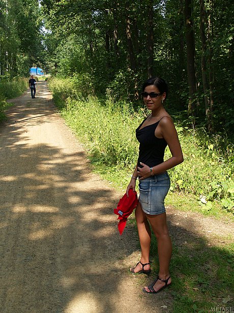 Brunette German Stefanie A showing off her large booty and melons in nature - Image 1 of 20  in Model category   featuring Stefanie A 