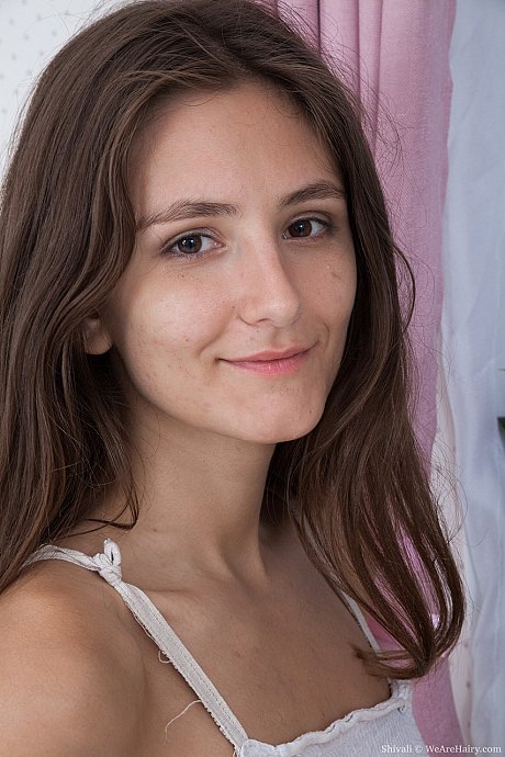 Brunette solo chick girl woman shows off her unshaven armpits and pussy in her bedroom - Image 1 of 18  in Pussy category   featuring Shivali 