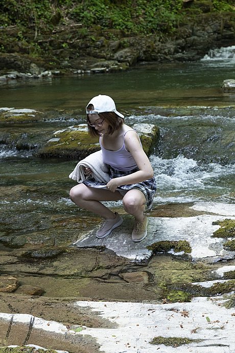 Redheaded geek Abby strips in the river and plays with her hairy pussy - Image 1 of 21  in Babe category   featuring Abby 