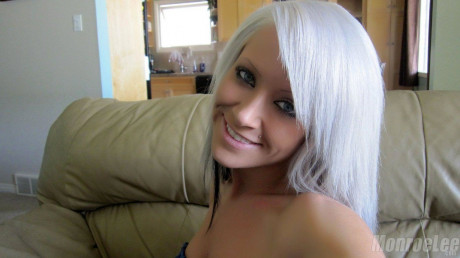 White haired skank Monroe Lee takes a selfie of her massive tits and undressed pussy