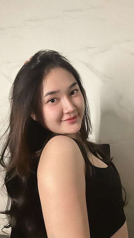 Thin asian young Lotus Huahang flaunts her humongous bum and natural boobies