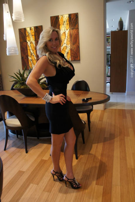 Stunning blonde babe on high heels exposing her humongous melons and snatch - #1530738