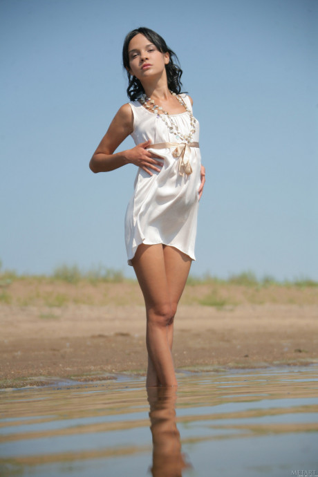 Petite young Ralina A stripping her dress and posing undressed by the water - #539313