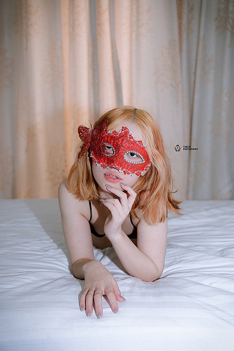 Cute ginger head young with a mask teases with her body before sex on her bed - Image 13 of 21  in Close Up category  