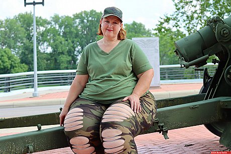 Obese amateur Goddess Pear models for a SFW shoot on an artillery gun in camo - Image 1 of 12  in Outdoor category   featuring Goddess Pear 