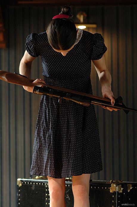 Adorable babe with a rifle Katya N strips and poses naked in a solo - Image 8 of 21  in Model category   featuring Katya N 