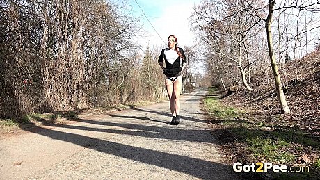 Redheaded slut girlfriend girl Sandra takes a badly needed piss on a rural road - Image 1 of 15  in Pussy category   featuring Sandra 