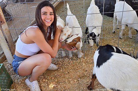 Smiley amateur babe Kylie poses in her denim shorts & white shirt at the zoo - Image 4 of 20  in Model category   featuring Kylie Rocket 