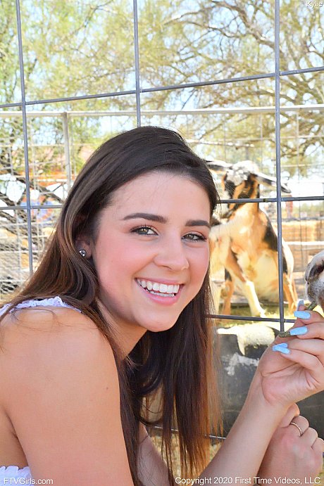 Smiley amateur babe Kylie poses in her denim shorts & white shirt at the zoo - Image 7 of 20  in Model category   featuring Kylie Rocket 