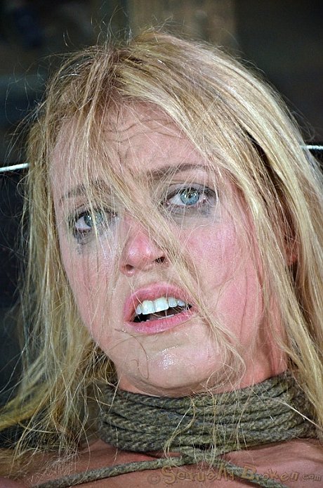2 busty females are restrained in humiliating ways in cage