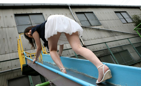 Japanese young Takako Kitahara exposes upskirt panties on slide at playground - #331395