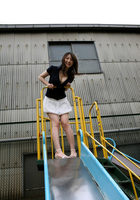 Japanese young Takako Kitahara exposes upskirt panties on slide at playground - #331396